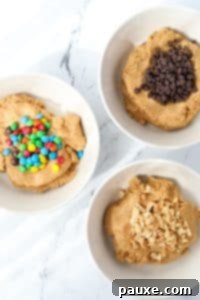 Protein-Packed Cookie Dough Bites 16 Three bowls of cookie dough, with three different mix-ins: chocolate chips, m&ms, and peanuts.