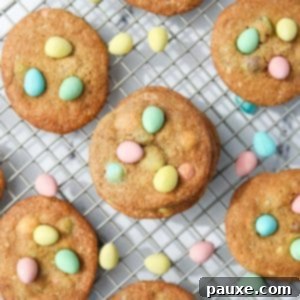 Speckled Spring Cookies 12 Homemade cookies on a wire rack, studded with Cadbury mini eggs.