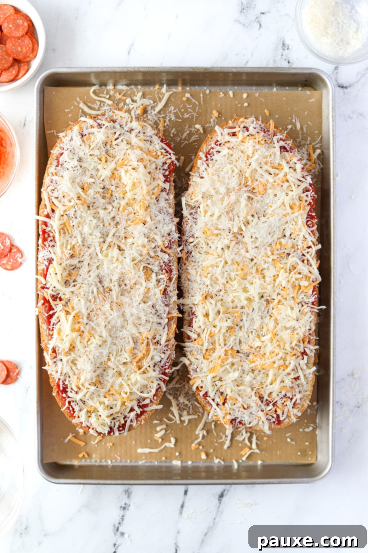 Speedy French Bread Pizzas 6 French bread topped with shredded cheese.
