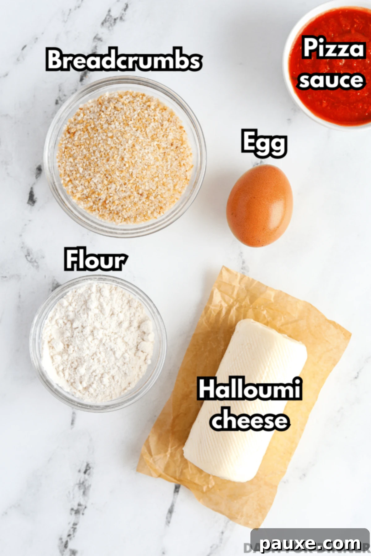 Crispy Air Fryer Halloumi Fries 3 A flat lay photograph showing the simple ingredients required for air fryer cheese fries: halloumi cheese, panko breadcrumbs, flour, a beaten egg, and a small bowl of pizza sauce for dipping.