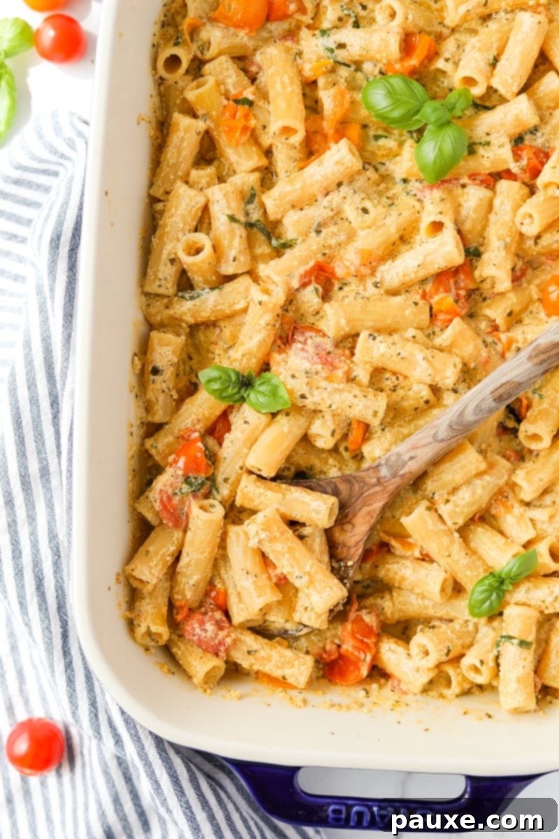 Creamy Boursin Pasta Bake 13 A baking dish filled with a creamy, rich Boursin cheese pasta, ready to be served.