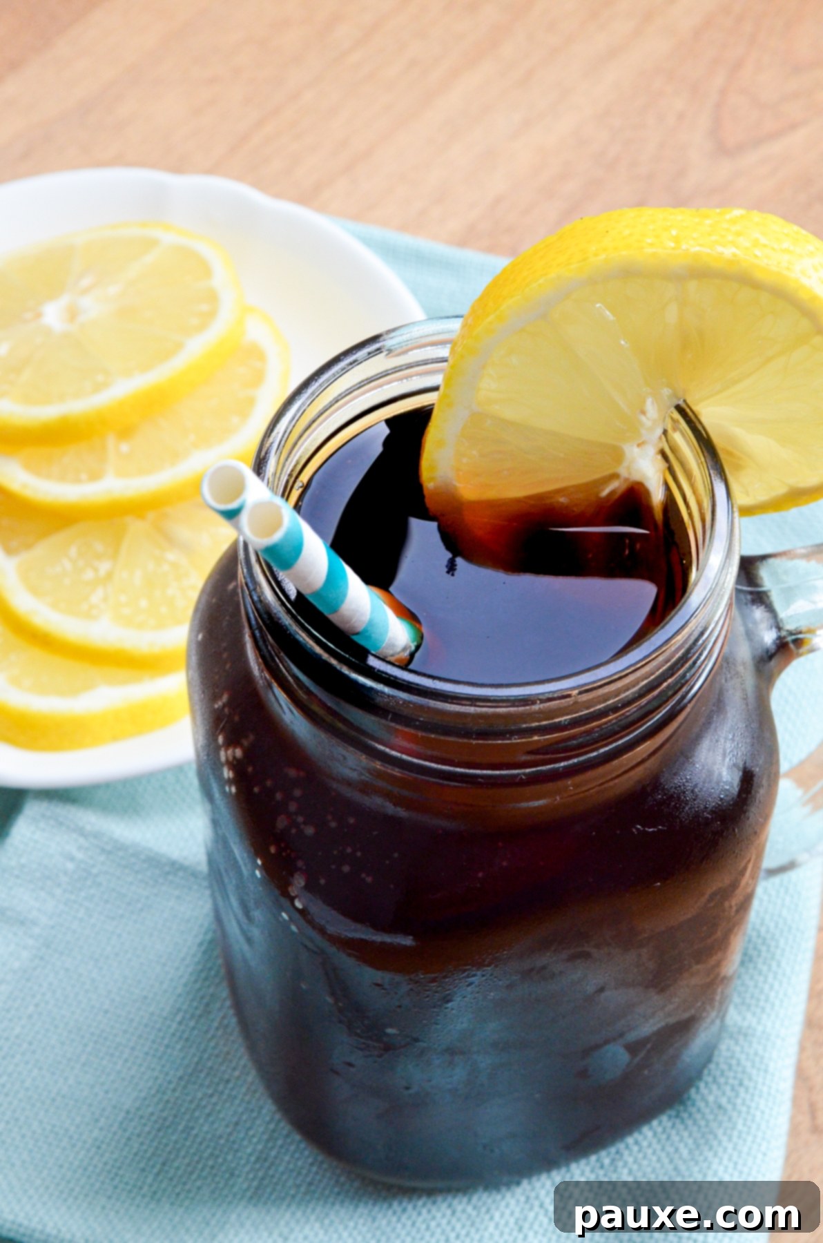 Crystal Clear Instant Pot Iced Tea 4 A frosty glass of perfectly brewed sweet tea, garnished with a bright lemon slice.