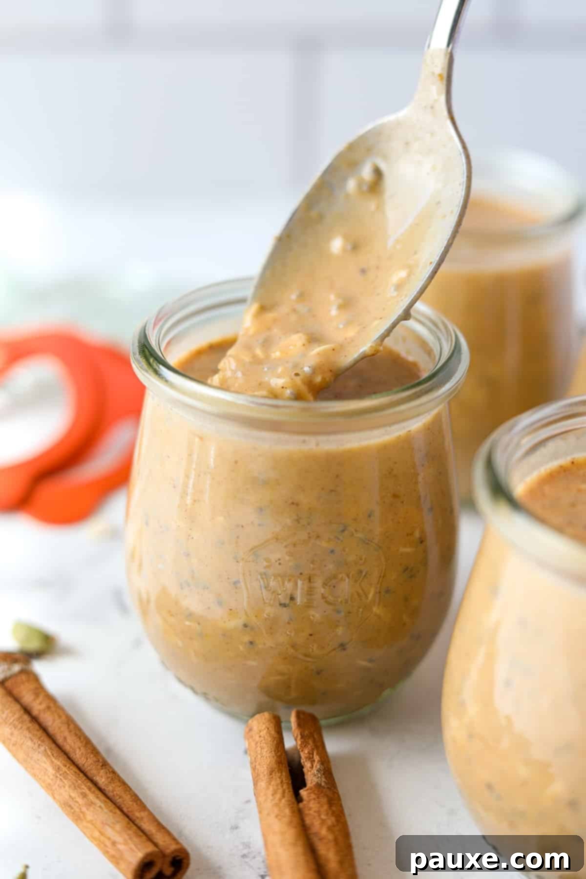 Pumpkin Spice Overnight Oats 9 Spoon an overnight oatmeal mixture into a jar.