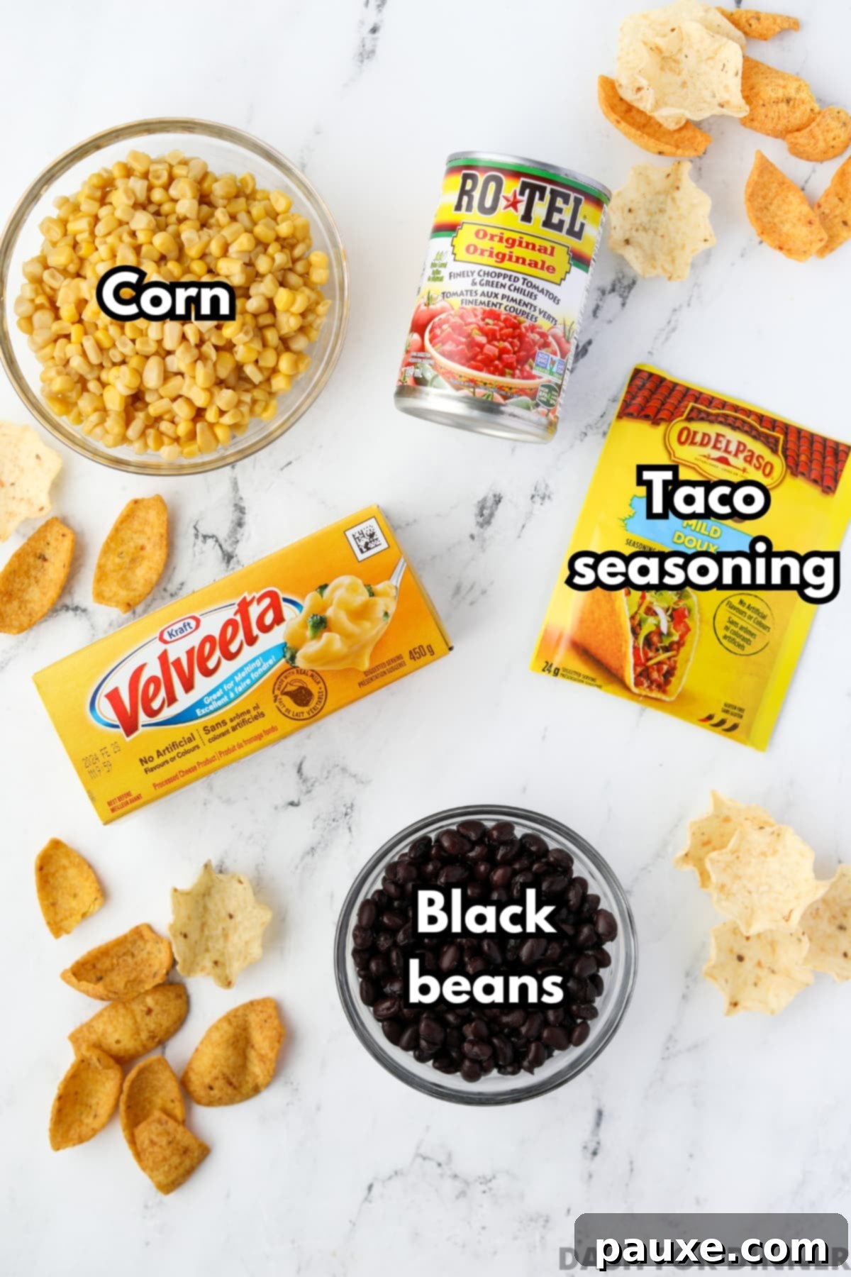 Zesty Fiesta Dip 3 The five key ingredients for Southwest Dip: Velveeta, black beans, canned corn, taco seasoning, and Rotel diced tomatoes with green chilies.