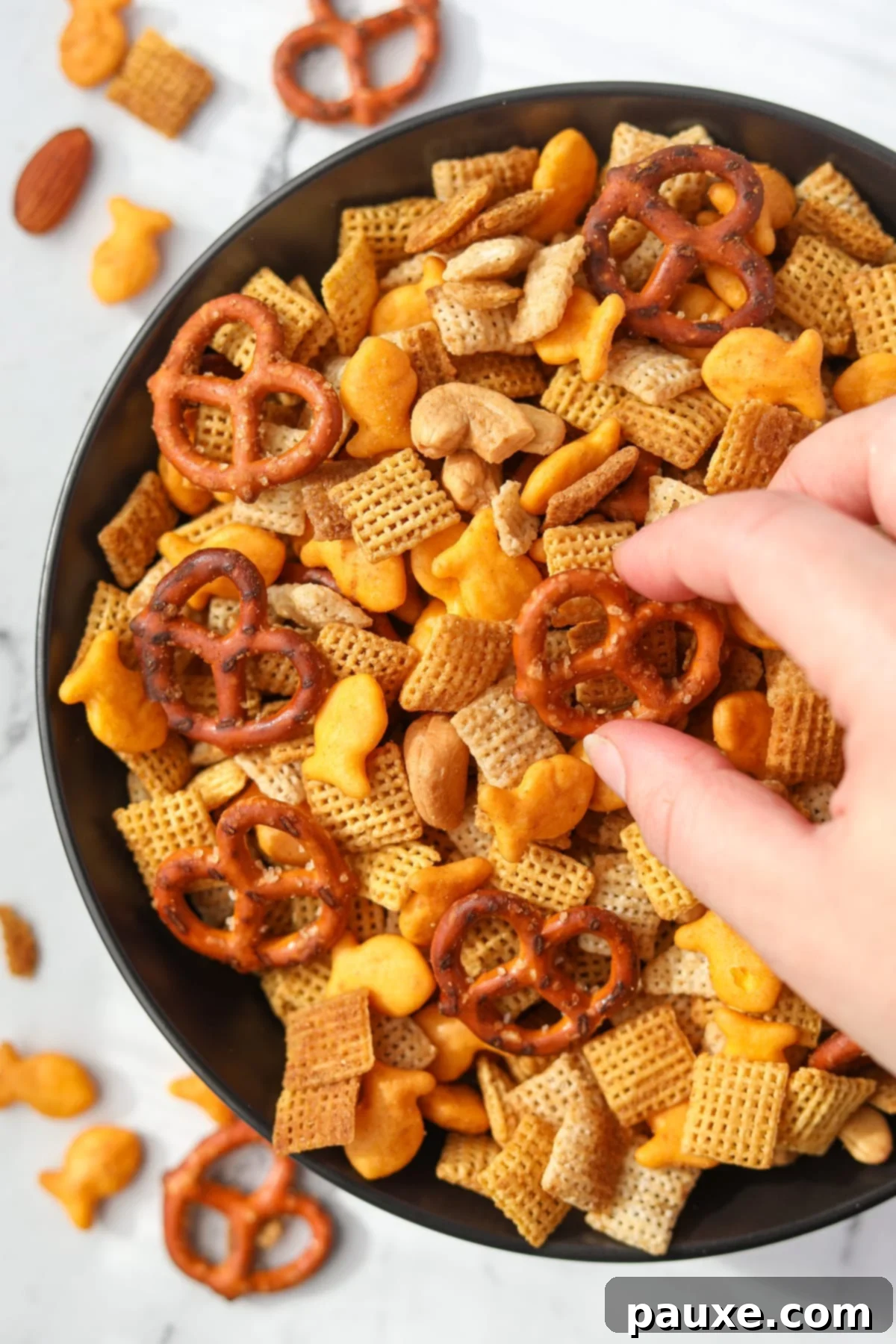 Savory Goldfish Crunch Mix 11 A snack bowl filled with homemade chex mix.