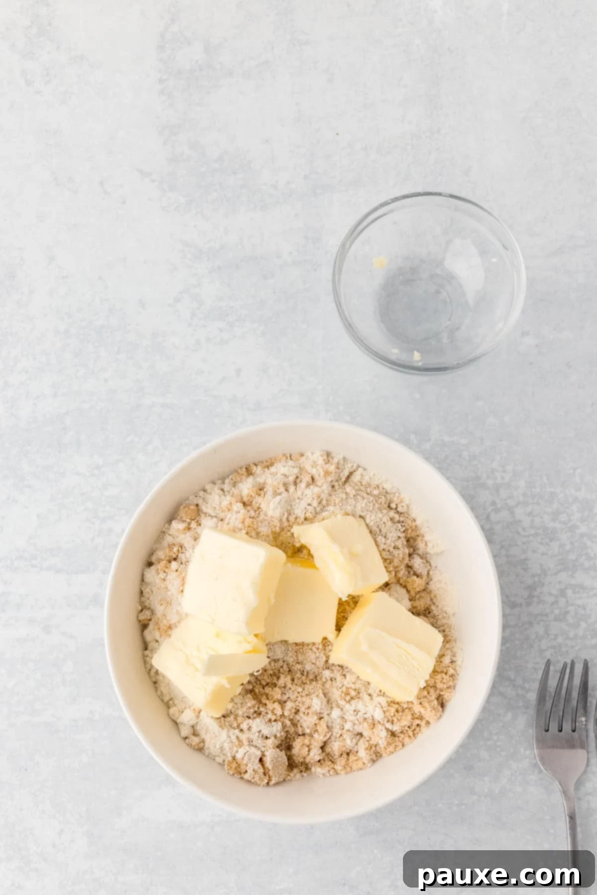 Pecan Streusel Sweet Potato Bake 8 A small bowl of flour and brown sugar with butter added.