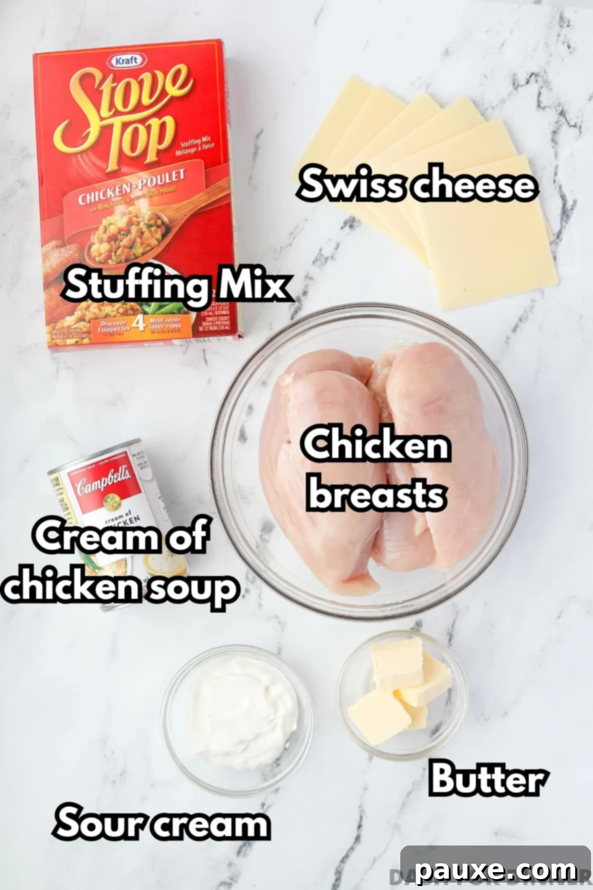 Alpine Chicken Comfort Bake 3 The six simple ingredients laid out for making creamy Swiss Chicken Casserole: chicken breasts, cream of chicken soup, stuffing mix, butter, Swiss cheese, and sour cream.