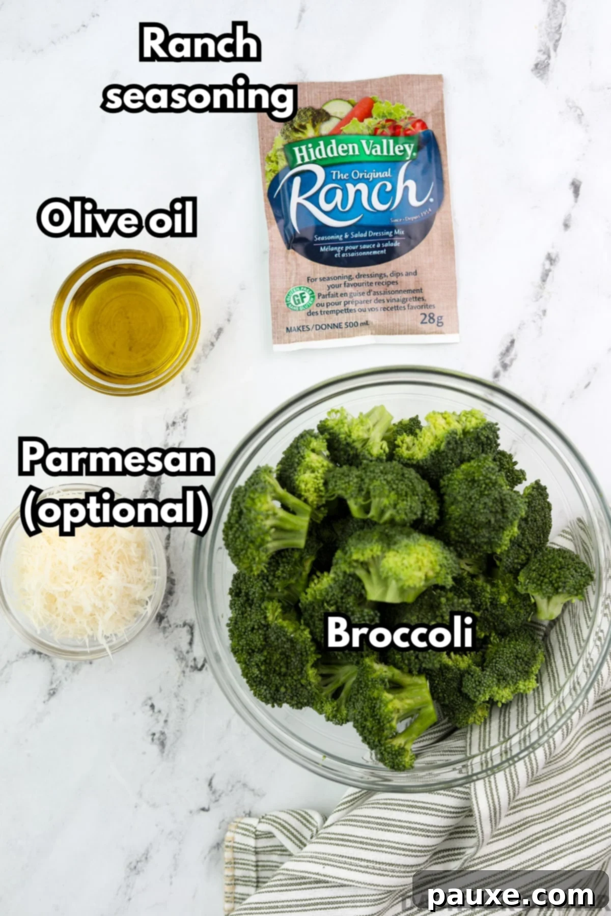 Zesty Ranch Roasted Broccoli 3 The simple ingredients needed to make ranch broccoli: fresh broccoli florets, golden olive oil, a packet of dry ranch seasoning, and a small mound of grated parmesan cheese.
