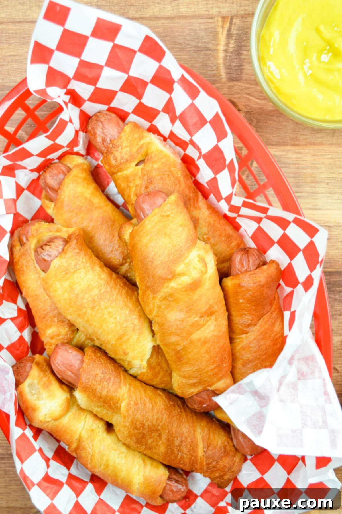 Air Fryer Pigs in a Crispy Blanket 2 A perfectly golden brown air fryer pig in a blanket, ready to be served.