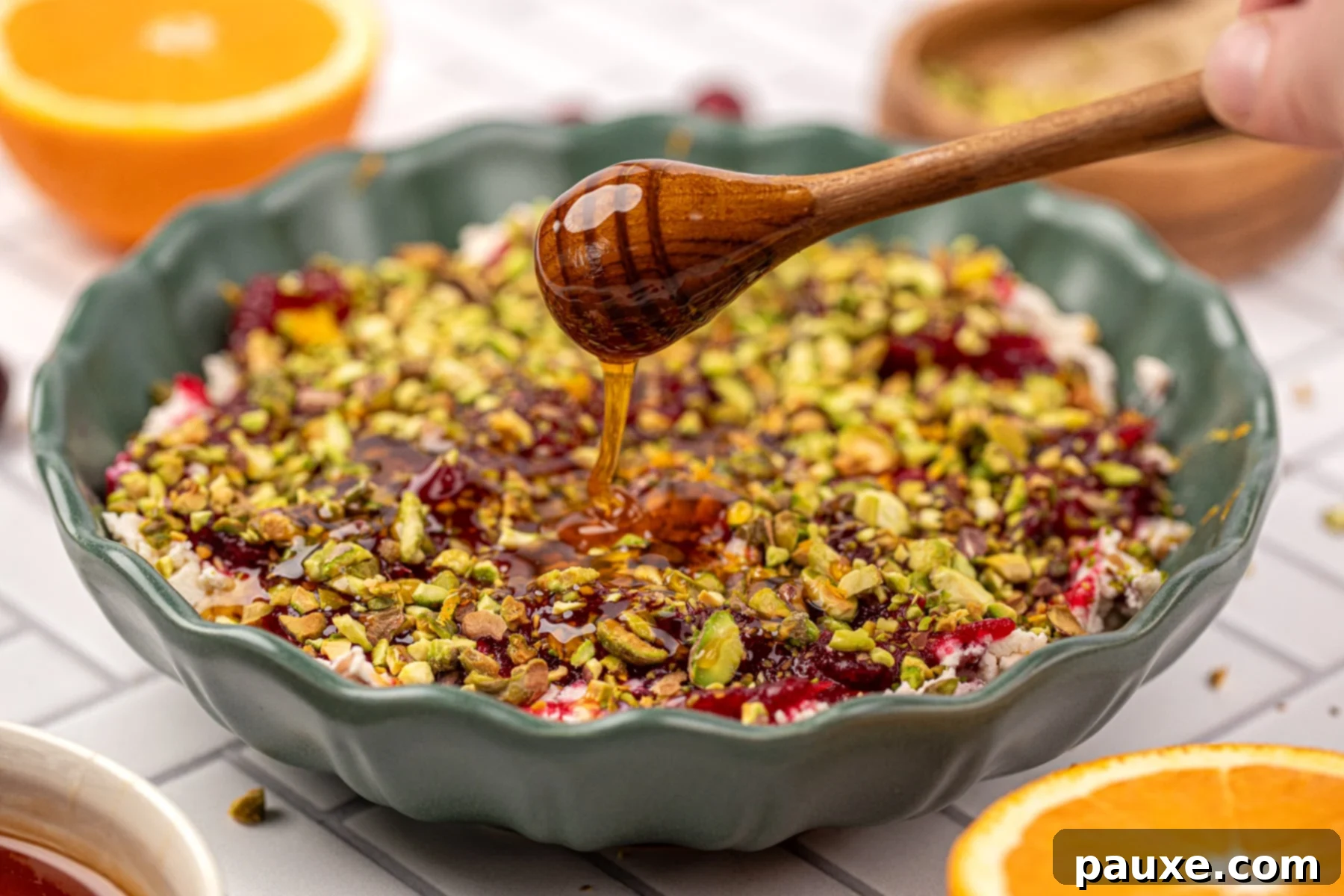 Drizzling honey on the dip