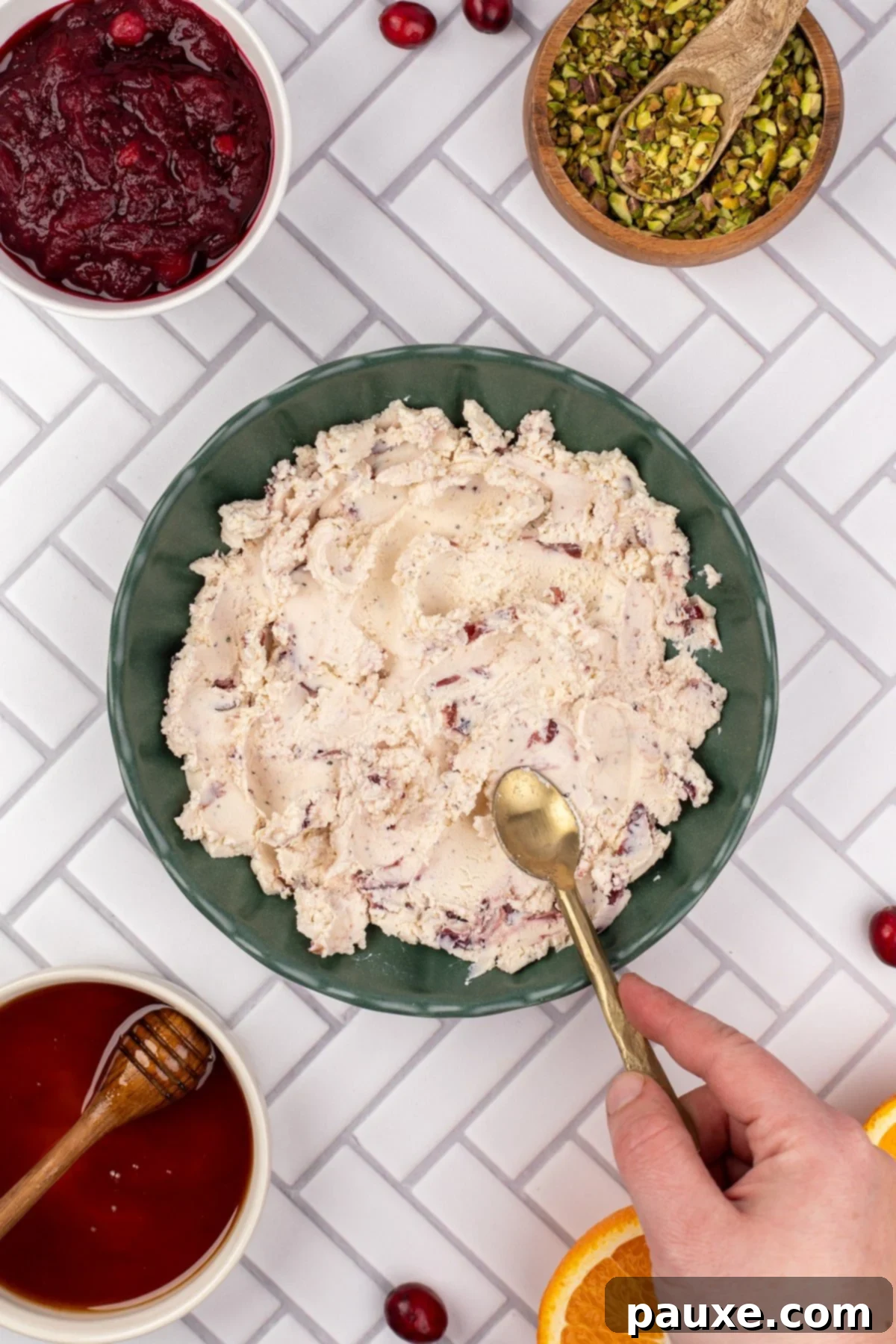 Spreading Boursin cheese in a serving bowl
