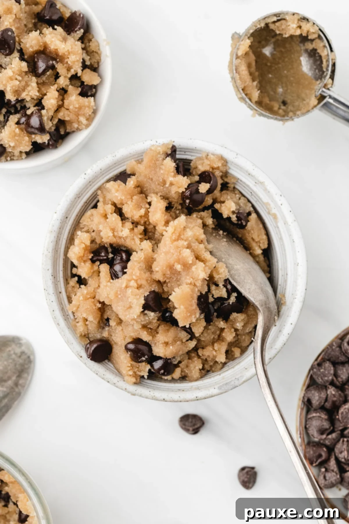 Safe-to-Eat Cookie Dough 2 A small bowl of edible cookie dough with a spoon in it