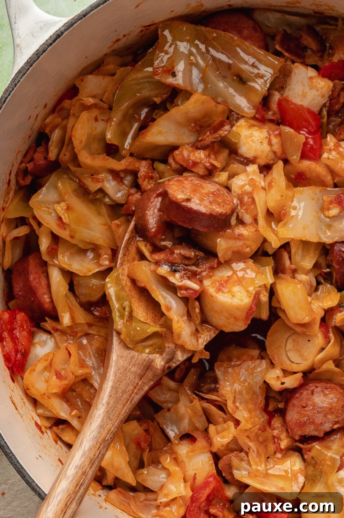 Heart of Palm Delights 6 Scooping cabbage stew from a Dutch oven.