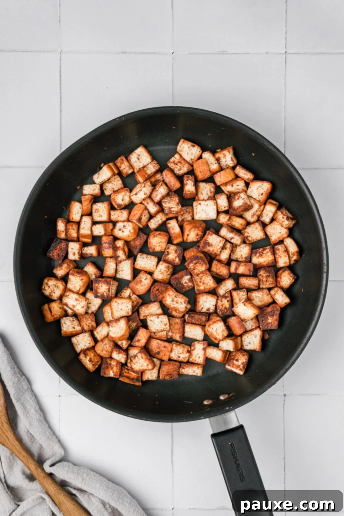 Creamy Autumn Harvest Soup 6 Golden brown cinnamon croutons in a skillet